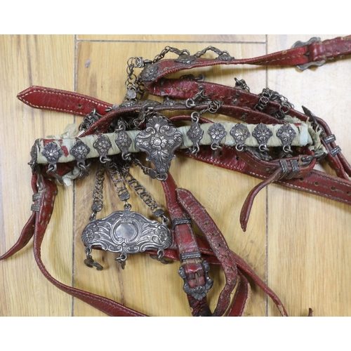 460 - A 19th century white metal-mounted leather horse bridle and martingale