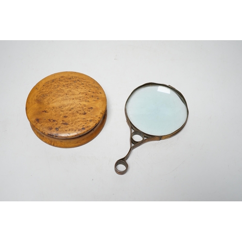 463 - A 19th century burr walnut snuff box, a gilt brass magnifying glass and a Chinese pillow, the larges... 