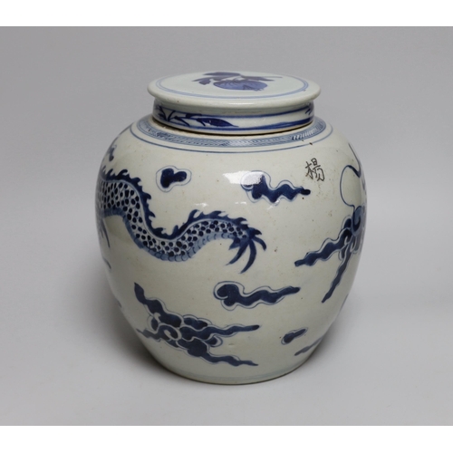 472 - An 18th/19th century Chinese blue and white dragon jar, with associated cover, jar 20.5cm high... 