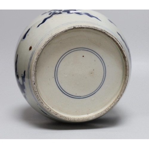 472 - An 18th/19th century Chinese blue and white dragon jar, with associated cover, jar 20.5cm high... 