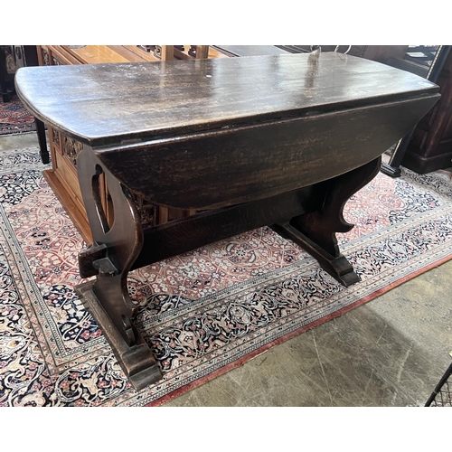 48 - An 18th century style Spanish design oak drop leaf dining table, length 122cm, depth 45cm, height 76... 