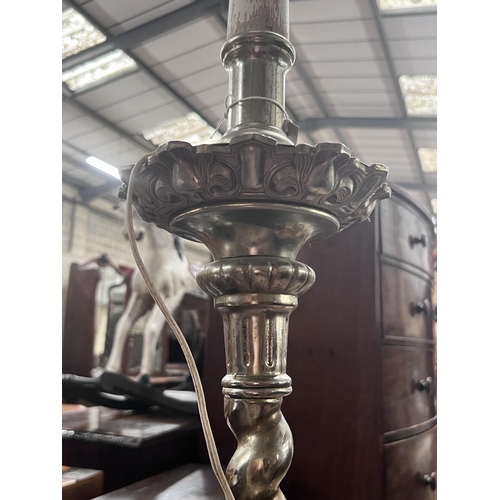 50 - An Italian style cast metal standard lamp, height 165cm