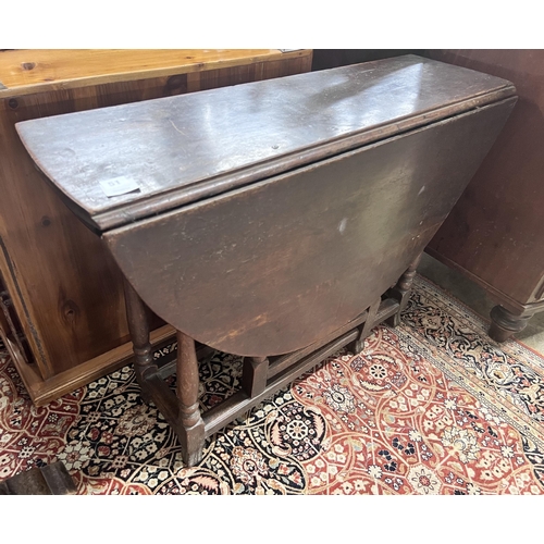 51 - A small 18th century oak gateleg table, width 97cm, depth 32cm, height 70cm