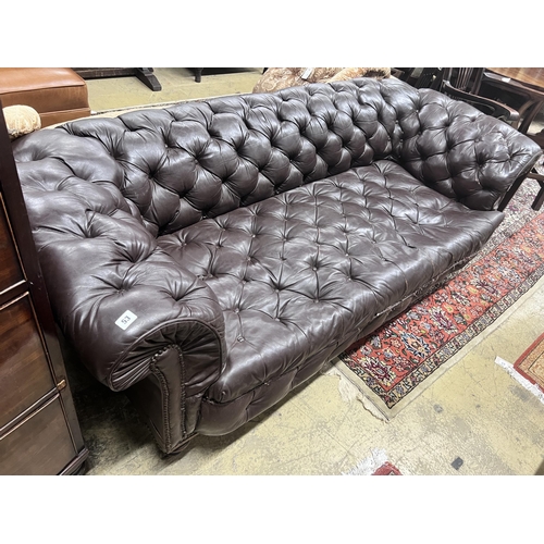 53 - A Victorian buttoned brown leather Chesterfield settee, length 200cm, width 84cm, height 68cm