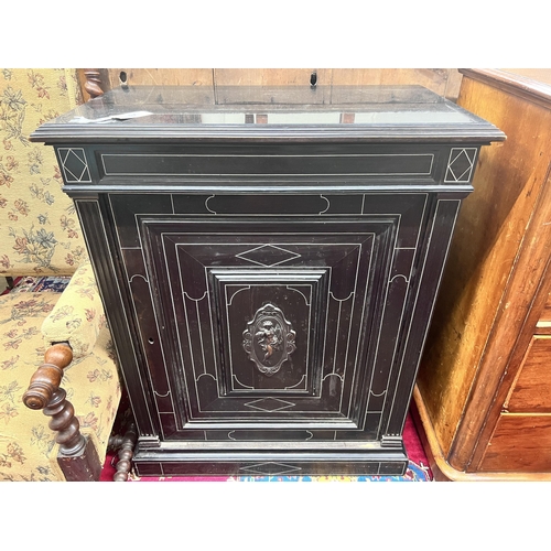 57 - A French ebonised marble top pier cabinet, width 79cm, depth 43cm, height 99cm