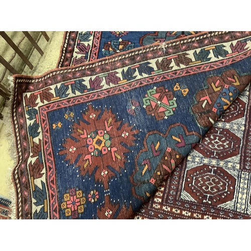 62 - A Caucasian Seychour blue ground rug, 144 x 98cm