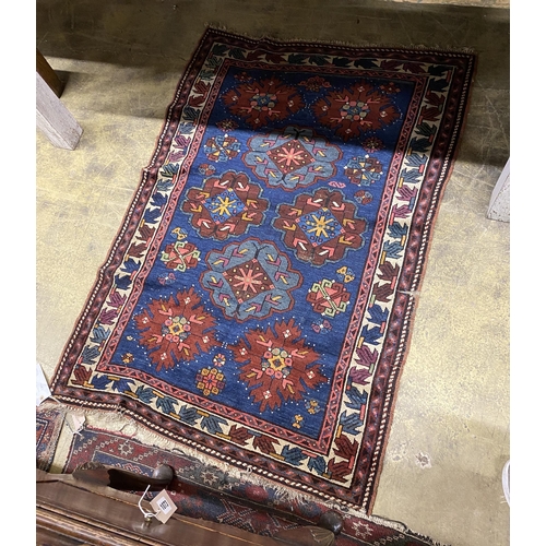 62 - A Caucasian Seychour blue ground rug, 144 x 98cm