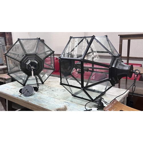 63 - A pair of contemporary octagonal glazed metal hall lanterns, height 96cm