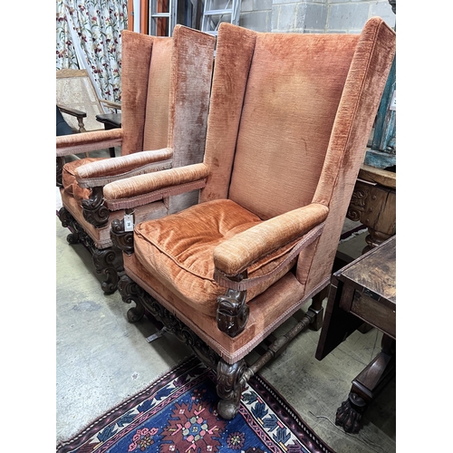 70 - A pair of 18th century style upholstered wing armchairs, width 72cm, depth 76cm, height 130cm