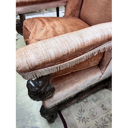 70 - A pair of 18th century style upholstered wing armchairs, width 72cm, depth 76cm, height 130cm