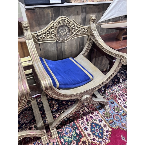 77 - A pair of hardwood and gilt composition 'X' frame chairs, width 72cm, depth 58cm, height 100cm... 