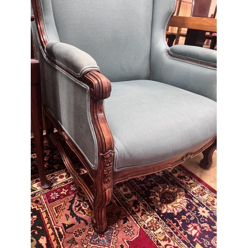 80 - A large Louis XVI style upholstered wing armchair, width 80cm, depth 82cm, height 116cm