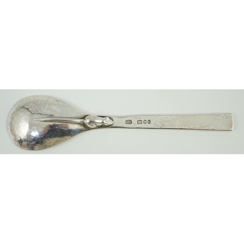 800 - An Elizabeth II Guild of Handcrafts planished silver rat tail spoon with applied rat verso, with eng... 