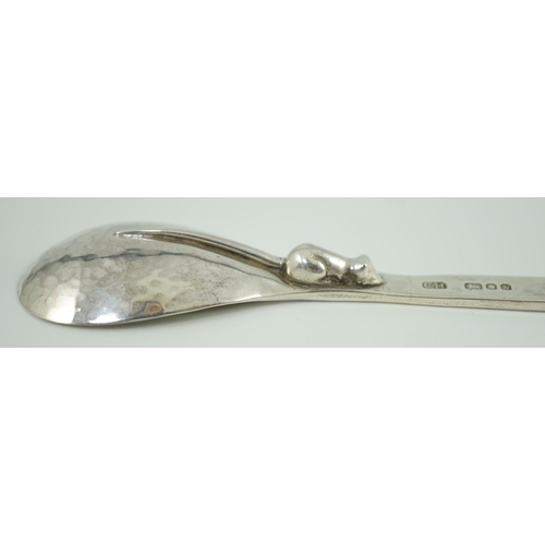 800 - An Elizabeth II Guild of Handcrafts planished silver rat tail spoon with applied rat verso, with eng... 