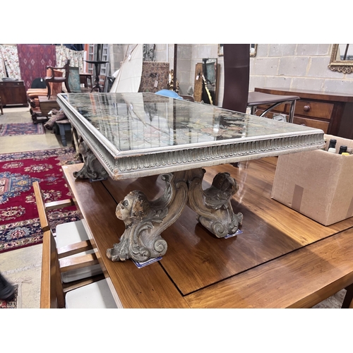 81 - An Italian carved pine rectangular coffee table with painted mirrored top, width 141cm, depth 62cm, ... 