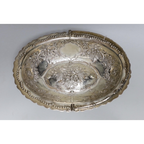 816 - A Victorian embossed silver oval fruit basket by John Samuel Hunt, London 1860, 32.5cm, 38.2oz.... 