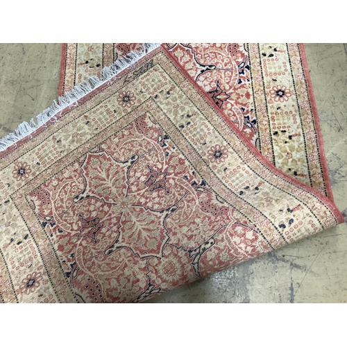 83 - A North West Persian red ground runner, 310 x 79cm