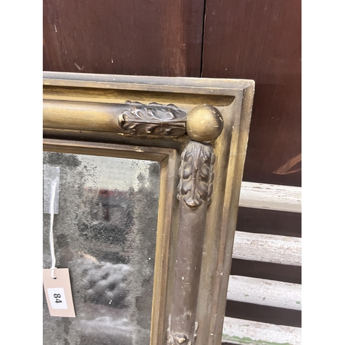 84 - An Irish Regency giltwood and composition overmantel mirror formerly housed within 'The Oaks', Derry... 