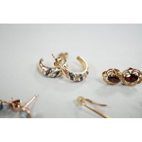 876 - A modern pair of 9ct gold and single stone diamond set elongated earrings, overall 58mm, a similar p... 