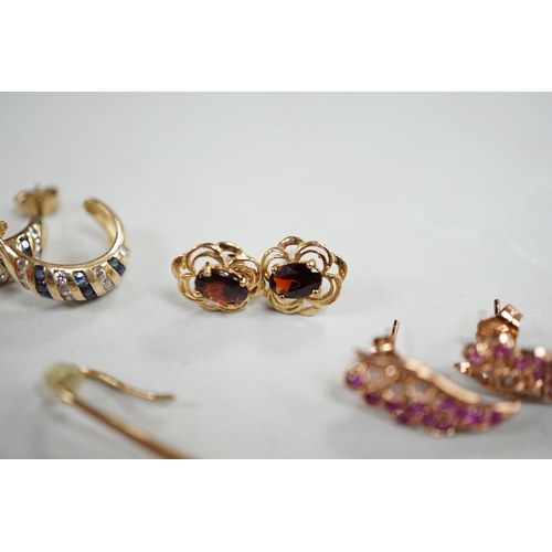 876 - A modern pair of 9ct gold and single stone diamond set elongated earrings, overall 58mm, a similar p... 