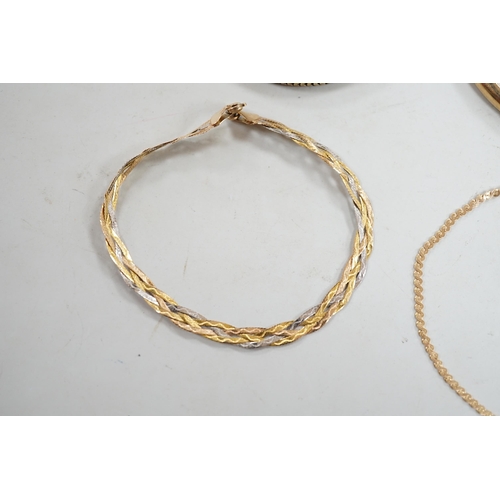 877 - A modern 9ct gold hinged bangle, two modern 9ct gold bracelets including three colour, 14.4 grams an... 