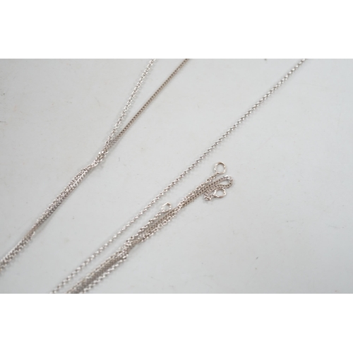 879 - Three assorted modern 18ct white gold fine link chains, longest 42cm, 5.9 grams.