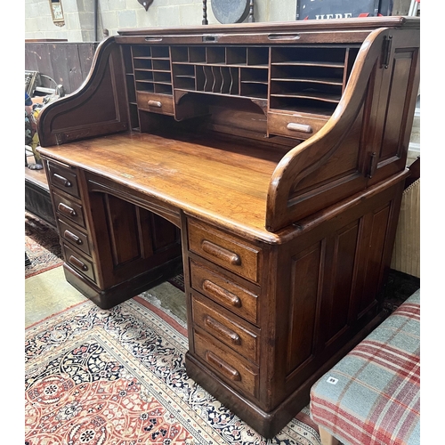 88 - An early 20th century walnut roll top desk with 'S' shaped tambour, width 152cm, depth 84cm, height ... 