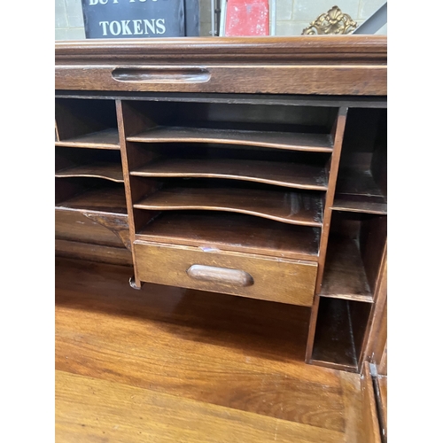 88 - An early 20th century walnut roll top desk with 'S' shaped tambour, width 152cm, depth 84cm, height ... 