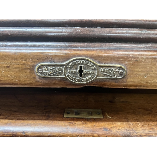 88 - An early 20th century walnut roll top desk with 'S' shaped tambour, width 152cm, depth 84cm, height ... 