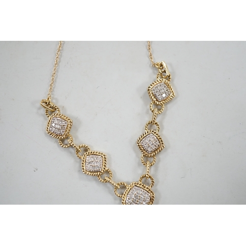 884 - A modern 9k and six pave set diamond panel drop necklace, with rope twist borders, 52cm, gross weigh... 