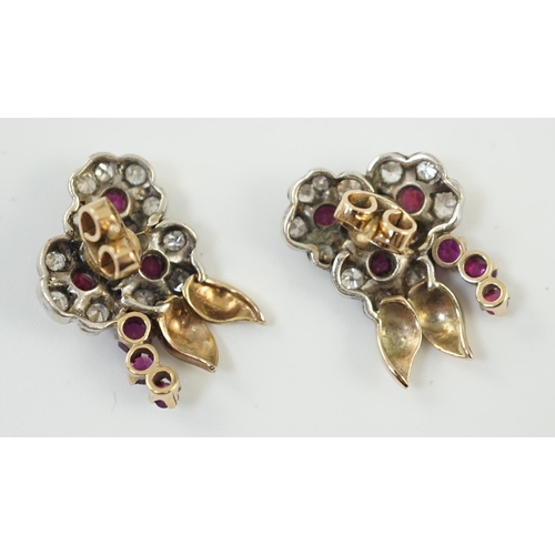 888 - A pair of 1950's gold ruby and diamond set triple flower head cluster earrings, 24mm, gross weight 6... 