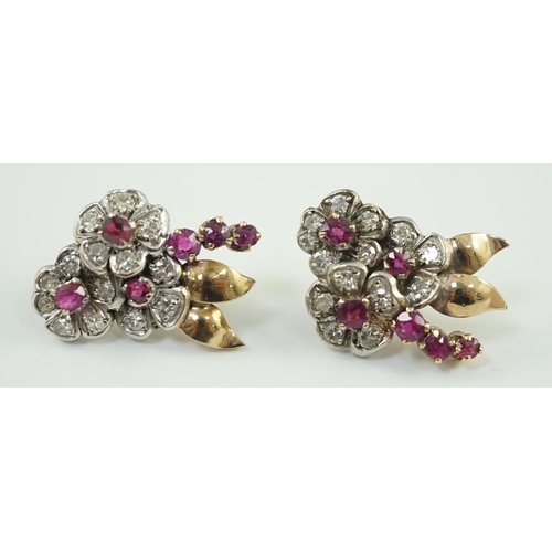 888 - A pair of 1950's gold ruby and diamond set triple flower head cluster earrings, 24mm, gross weight 6... 