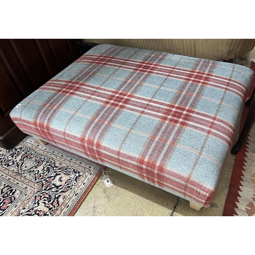 89 - A large rectangular contemporary footstool upholstered in Colefax & Fowler tartan fabric, length 102... 