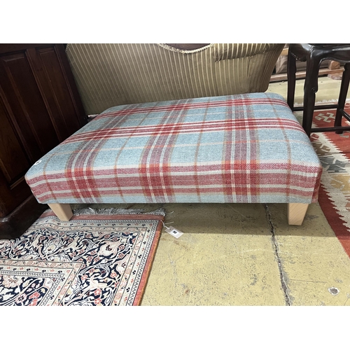 89 - A large rectangular contemporary footstool upholstered in Colefax & Fowler tartan fabric, length 102... 