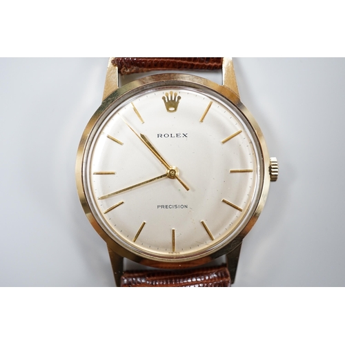 907 - A gentleman's 1960's 9ct gold Rolex Precision manual wind wrist watch, on associated leather strap, ... 