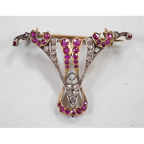 908 - An early 20th century yellow metal, ruby and diamond cluster set brooch (stone missing), width 41mm,... 