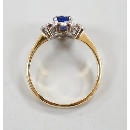 909 - A modern 18ct gold, sapphire and diamond set circular cluster ring, size P/Q, gross weight 3.4 grams... 