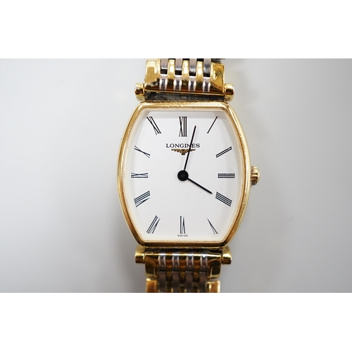 929 - A lady's steel and gold plated Le Grande Classique de Longines quartz wrist watch, no box or papers.... 