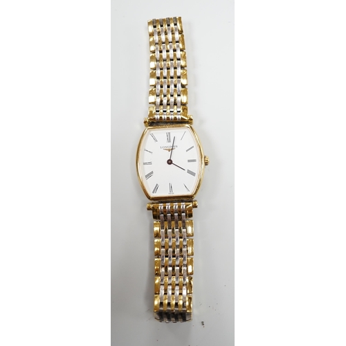 929 - A lady's steel and gold plated Le Grande Classique de Longines quartz wrist watch, no box or papers.... 