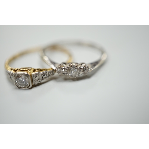 933 - Two 18ct,plat and diamond set rings including single stone, size Q and three stone, size O/P, gross ... 