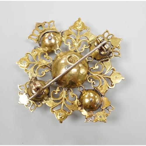 937 - A 19th century continental pierced yellow metal and emerald cluster set quatrefoil brooch, 47mm, gro... 