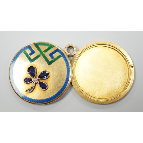 938 - An Art Deco yellow metal, three colour enamel, synthetic? sapphire and diamond set circular locket, ... 