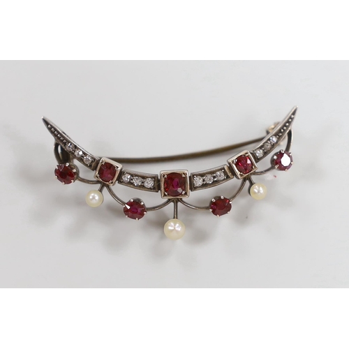 943 - A late Victorian yellow metal, diamond, ruby and seed pearl set crescent brooch, 45mm, gross weight ... 