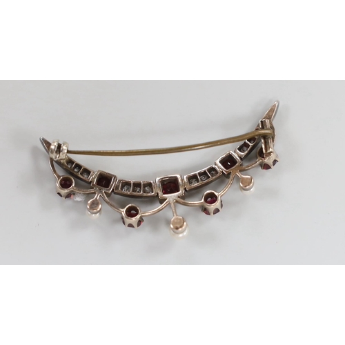 943 - A late Victorian yellow metal, diamond, ruby and seed pearl set crescent brooch, 45mm, gross weight ... 