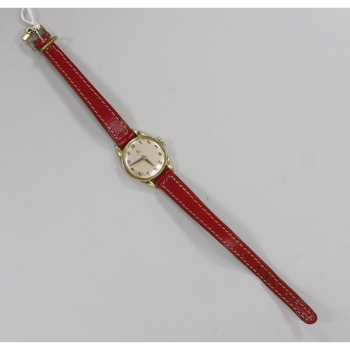 947 - A lady's 18k Omega manual wind wrist watch, on a leather strap with 9ct gold buckle with Omega insig... 