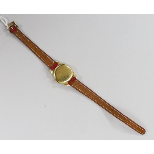 947 - A lady's 18k Omega manual wind wrist watch, on a leather strap with 9ct gold buckle with Omega insig... 