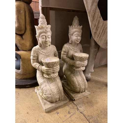 1 - A pair of Thai style composition faux marble kneeling attendant garden ornaments, height 85cm