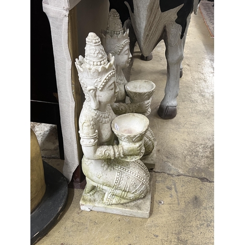 1 - A pair of Thai style composition faux marble kneeling attendant garden ornaments, height 85cm