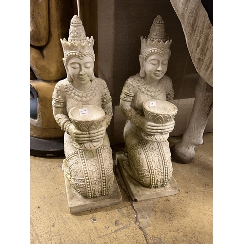 1 - A pair of Thai style composition faux marble kneeling attendant garden ornaments, height 85cm