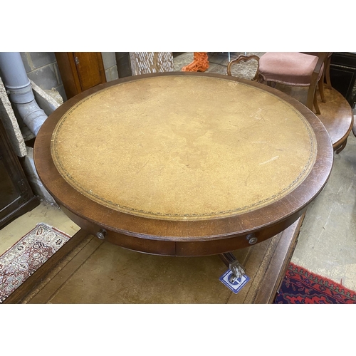 1022 - A reproduction mahogany circular drum coffee table, diameter 110cm, height 54cm